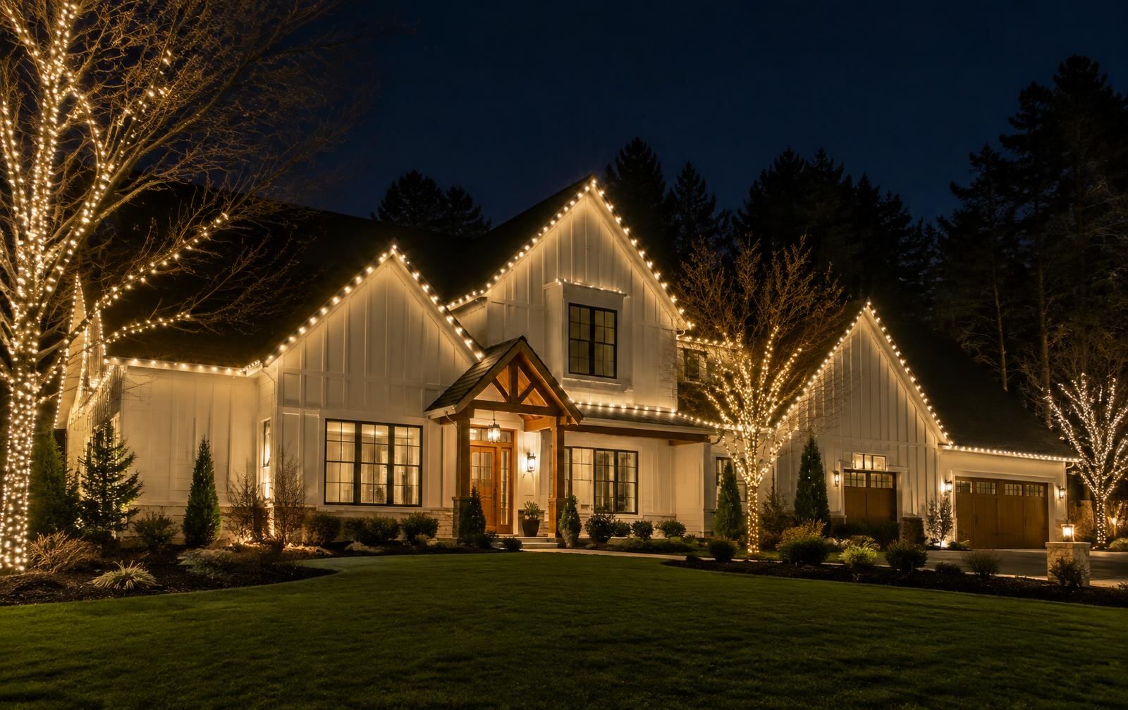 Farmhouse with permanent LED lighting along the roofline